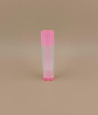 Μικρή, ομαλή, διαυγή συσκευασία με ροζ καπάκι για κραγιόν