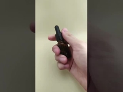 Μίνι, διαφανές, καφέ, λείο, στρογγυλό φιαλίδιο με σταγονόμετρο για περιποίηση δέρματος, με λεπτό σχεδιασμό