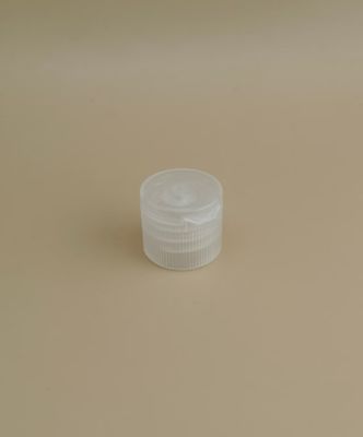 Μικρό διαφανές στρογγυλό ριμμένο πλαστικό καπάκι για μπουκάλια καλλυντικών